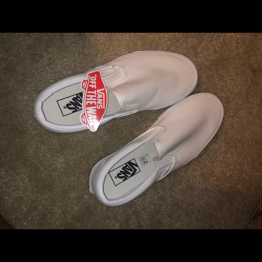 white slip on vans